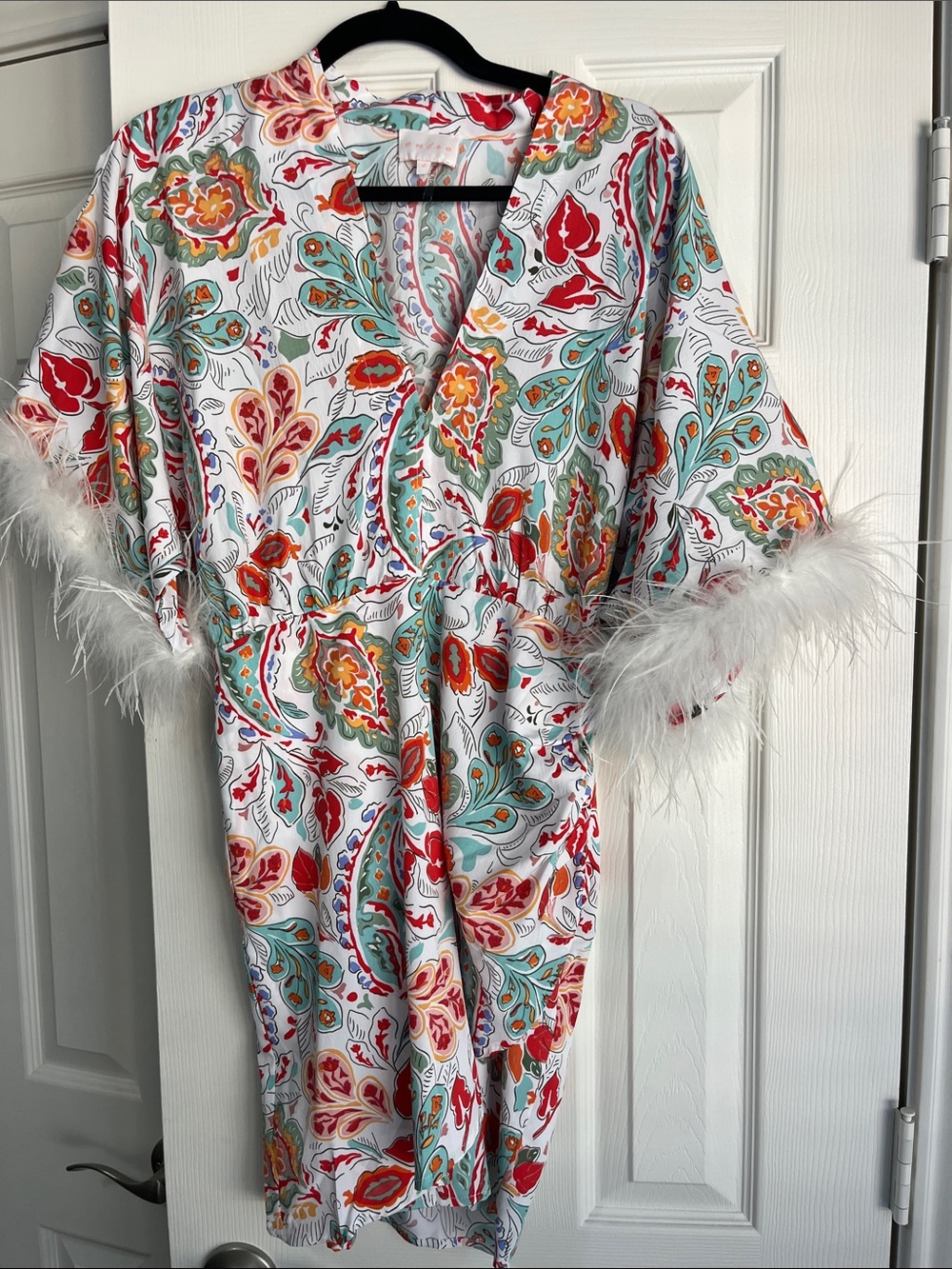 Entry White print dress with Red, Teal, & Orange Paisley Print and feather trim